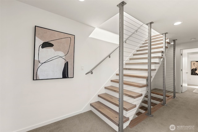 stairway featuring recessed lighting, carpet, and baseboards