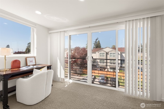 carpeted office space with a wealth of natural light and recessed lighting