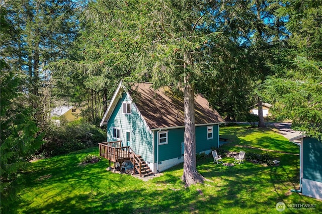 12916 91st Street Ct, Anderson Island, WA 98303 - view of side of home featuring crawl space and a yard