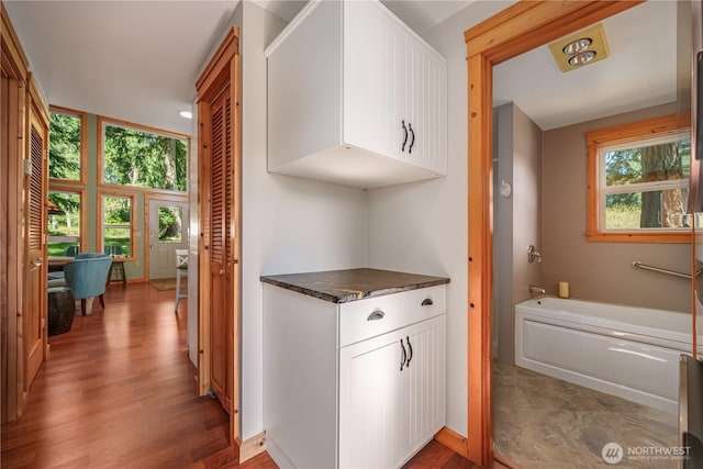 12916 91st Street Ct, Anderson Island, WA 98303 - hallway featuring wood finished floors
