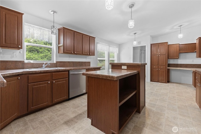 23914 66th St E Unit 33, Buckley, WA 98391 - kitchen with a center island, stainless steel dishwasher, dark countertops, hanging light fixtures, and open shelves