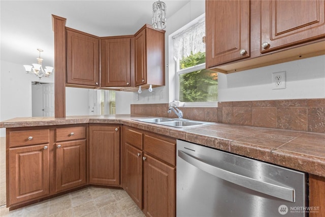 23914 66th St E Unit 33, Buckley, WA 98391 - kitchen with dishwasher, a chandelier, brown cabinets, and plenty of natural light
