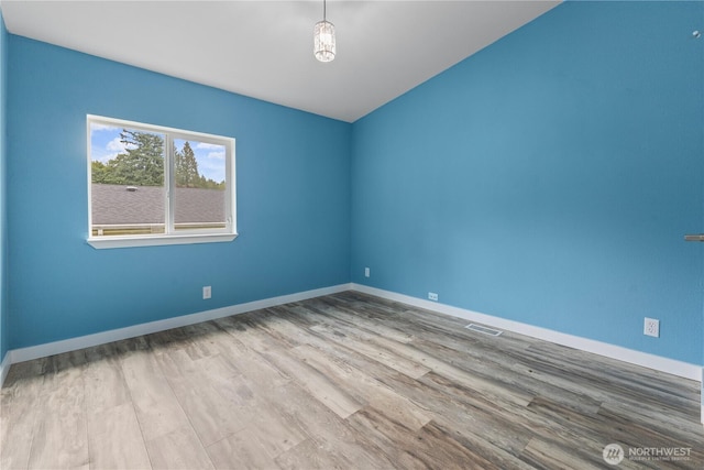 23914 66th St E Unit 33, Buckley, WA 98391 - empty room with wood finished floors