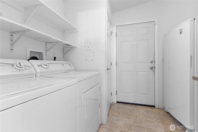 23914 66th St E Unit 33, Buckley, WA 98391 - washroom with washer and clothes dryer