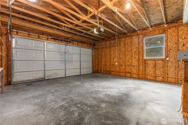 23914 66th St E Unit 33, Buckley, WA 98391 - garage featuring a garage door opener