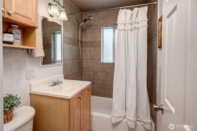 full bathroom featuring shower / tub combo, toilet, and vanity