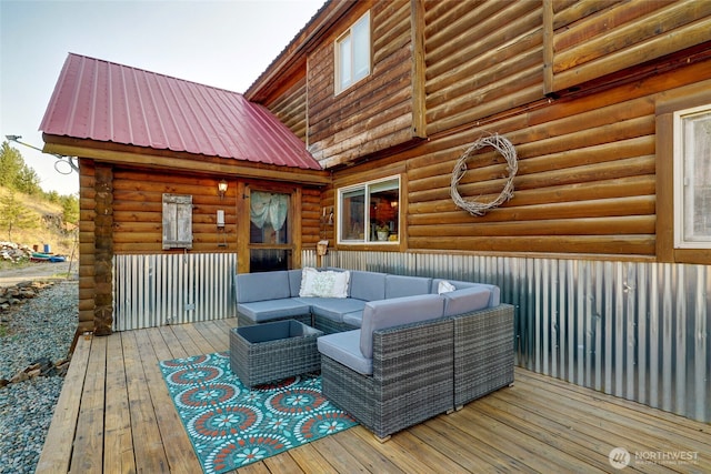 wooden deck with outdoor lounge area
