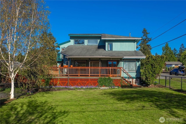 5201 Hyada Blvd NE, Tacoma, WA 98422 - view of front facade with fence, a front lawn, and covered porch