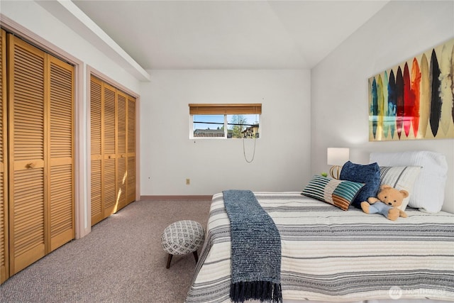 5201 Hyada Blvd NE, Tacoma, WA 98422 - bedroom featuring multiple closets, baseboards, carpet, and vaulted ceiling