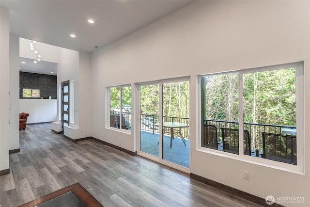 43 Rocky Ridge Dr, Bellingham, WA 98229 - doorway to outside featuring recessed lighting, wood finished floors, a high ceiling, and baseboards