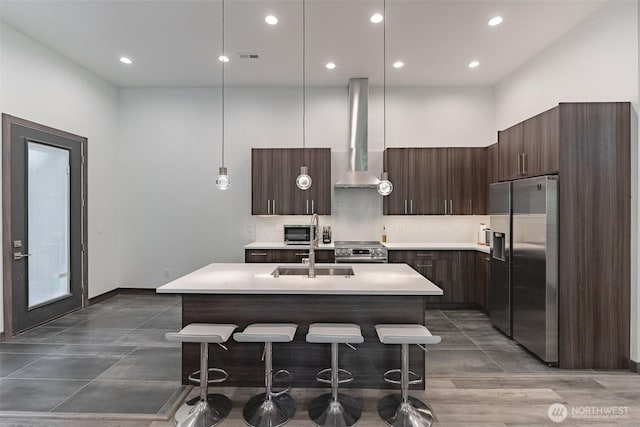 43 Rocky Ridge Dr, Bellingham, WA 98229 - kitchen featuring modern cabinets, wall chimney exhaust hood, appliances with stainless steel finishes, and a sink