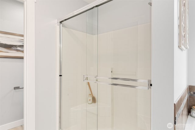 bathroom featuring a stall shower