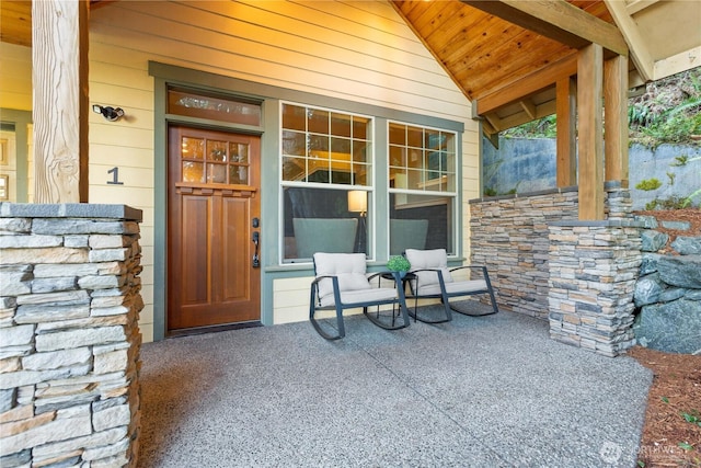 entrance to property with a porch