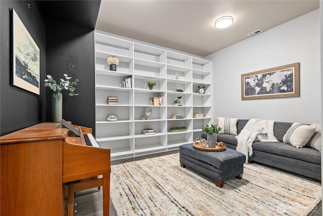 sitting room with wood finished floors