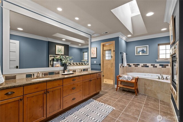 bathroom with a garden tub, ornamental molding, tile patterned floors, recessed lighting, and a shower stall