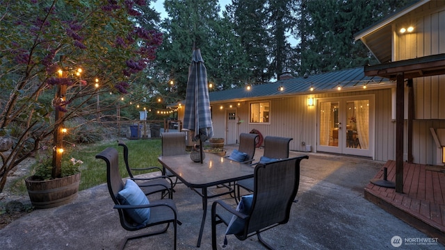 19134 SE May Valley Rd, Issaquah, WA 98027 - view of patio / terrace with french doors and outdoor dining area