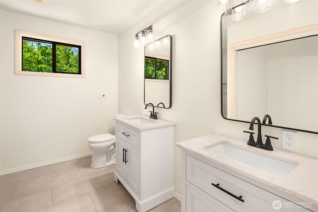 26032 5th Ave NE, Arlington, WA 98223 - full bath featuring two vanities and tile patterned flooring