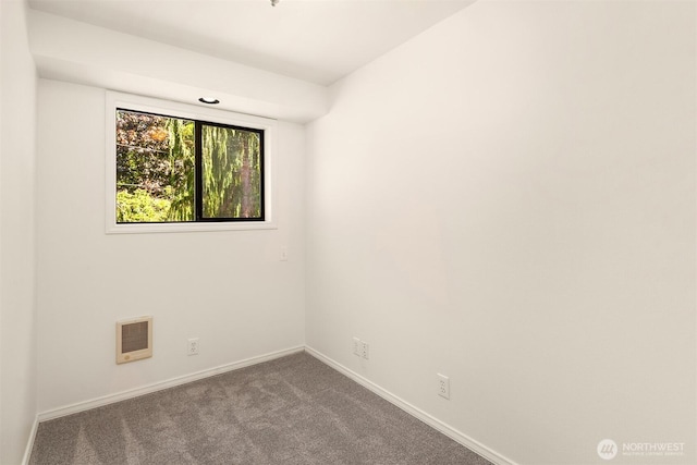 26032 5th Ave NE, Arlington, WA 98223 - empty room featuring dark carpet and heating unit