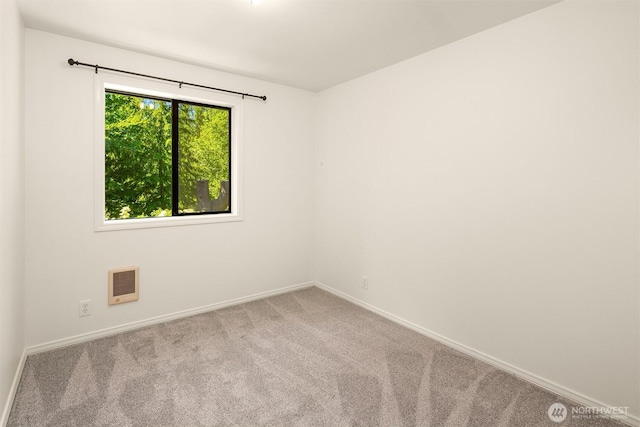 26032 5th Ave NE, Arlington, WA 98223 - unfurnished room featuring heating unit and carpet floors