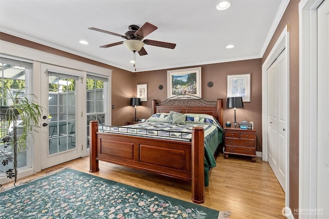 bedroom featuring recessed lighting, light wood-style floors, ornamental molding, and access to exterior