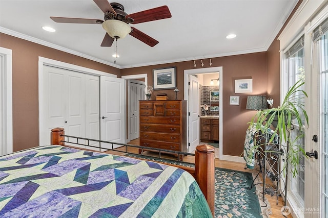 bedroom with recessed lighting, wood finished floors, a closet, ceiling fan, and crown molding