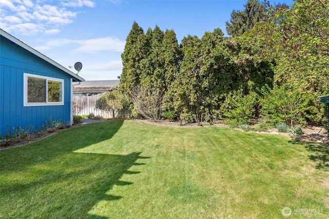 view of yard with fence