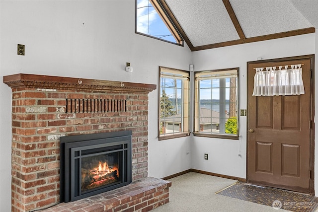 5323 Hyada Blvd NE, Tacoma, WA 98422 - carpeted entrance foyer featuring vaulted ceiling, baseboards, and a brick fireplace