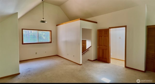 500 N Duckabush Dr W, Hoodsport, WA 98548 - unfurnished bedroom featuring carpet, vaulted ceiling, and baseboards