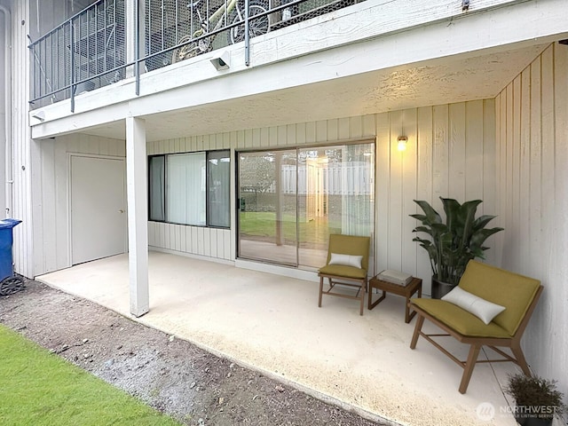 3435 Auburn Way S Unit 9, Auburn, WA 98092 - view of exterior entry with a patio and a balcony
