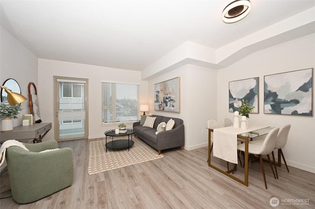 1760 NW 56th St Unit 601, Seattle, WA 98107 - living room featuring light wood-type flooring and baseboards