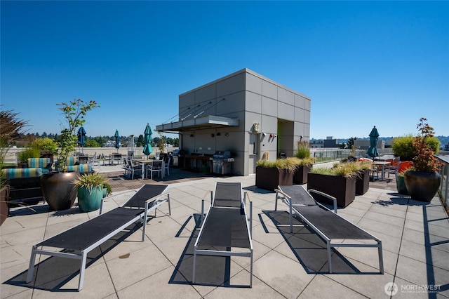 1760 NW 56th St Unit 601, Seattle, WA 98107 - view of patio featuring area for grilling