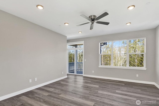 unfurnished room featuring baseboards, a ceiling fan, dark wood-style floors, and recessed lighting