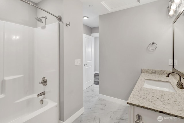 full bath with marble finish floor, baseboards, shower / bathtub combination, and vanity