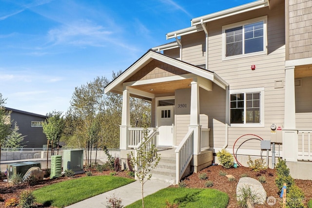 view of front of house featuring fence