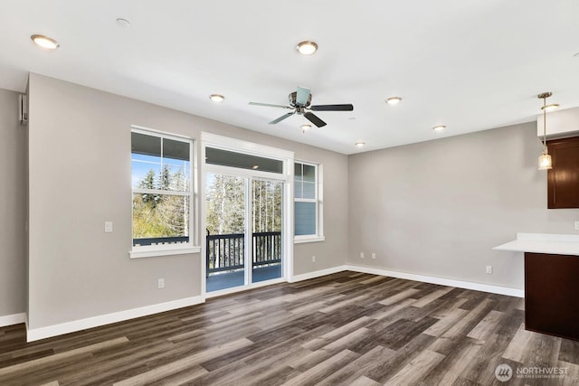3513 Sussex Dr, Bellingham, WA 98226 - unfurnished living room with baseboards, dark wood-style flooring, a ceiling fan, and recessed lighting