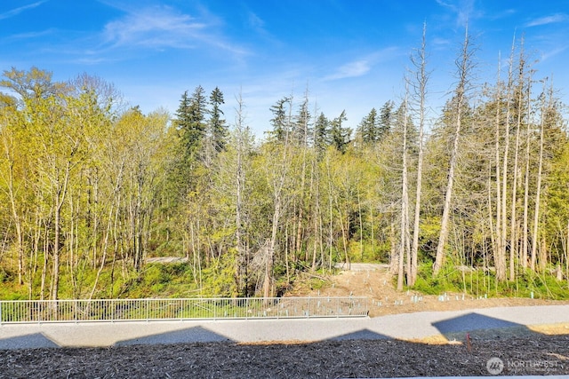 3513 Sussex Dr, Bellingham, WA 98226 - view of yard featuring a view of trees and fence