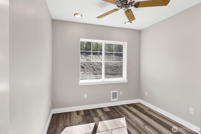 3513 Sussex Dr, Bellingham, WA 98226 - unfurnished room featuring dark wood finished floors, visible vents, baseboards, and a ceiling fan