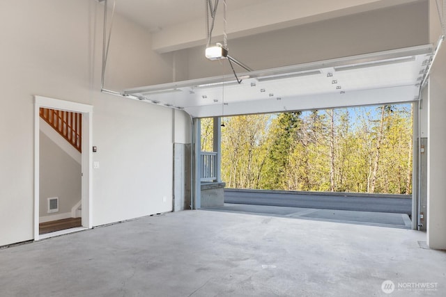 3513 Sussex Dr, Bellingham, WA 98226 - garage featuring visible vents and a garage door opener