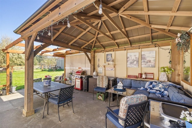 view of patio with outdoor lounge area, outdoor dining space, and a gazebo