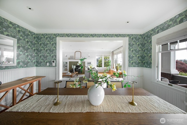 4015 S Andover St, Seattle, WA 98118 - dining space featuring wallpapered walls, wainscoting, and healthy amount of natural light