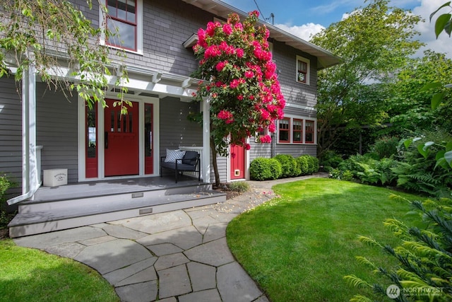 4015 S Andover St, Seattle, WA 98118 - property entrance with a yard and a porch