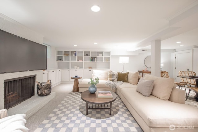 4015 S Andover St, Seattle, WA 98118 - living area with recessed lighting and a brick fireplace