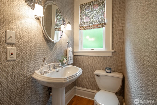 4015 S Andover St, Seattle, WA 98118 - bathroom with toilet and wood finished floors