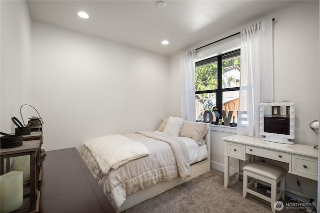 carpeted bedroom with recessed lighting