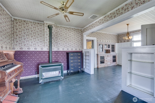 2231 Highland Ave, Everett, WA 98201 - unfurnished living room featuring wallpapered walls, ornamental molding, and a wood stove