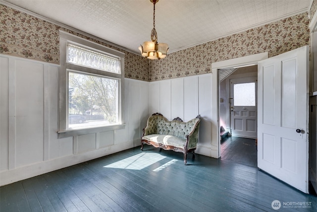 2231 Highland Ave, Everett, WA 98201 - living area with a healthy amount of sunlight, wainscoting, wallpapered walls, and dark wood-style floors