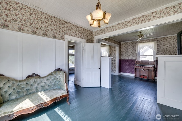 2231 Highland Ave, Everett, WA 98201 - sitting room with a ceiling fan, dark wood-style flooring, crown molding, a wainscoted wall, and wallpapered walls