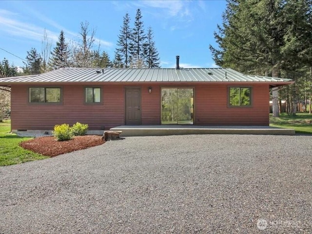 view of front of house featuring metal roof