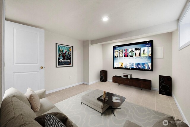home theater with recessed lighting, baseboards, and light tile patterned floors