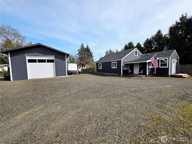 6818 Olympic Hwy, Aberdeen, WA 98520 - ranch-style house featuring an outdoor structure, fence, a detached garage, and dirt driveway